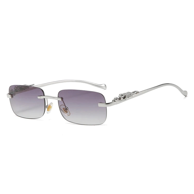 Rechteckige, randlose Sonnenbrille mit Metall-Scharnier & Cheetah-Details – unisex, retro & stylish mit UV400-Schutz für sonnige Tage.