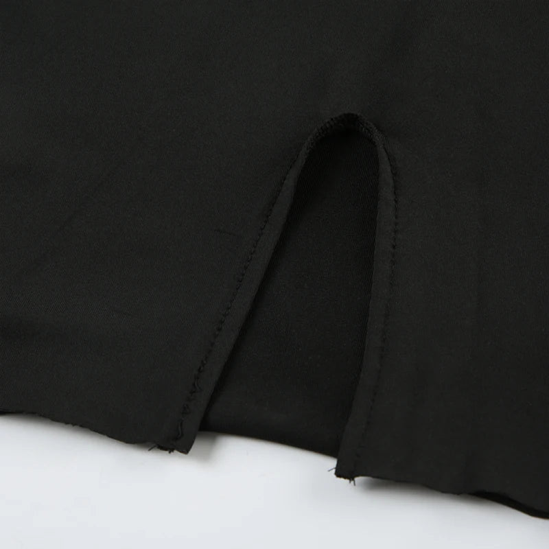 Black mini dress with long sleeves and lacing – backless and figure-hugging in streetwear look