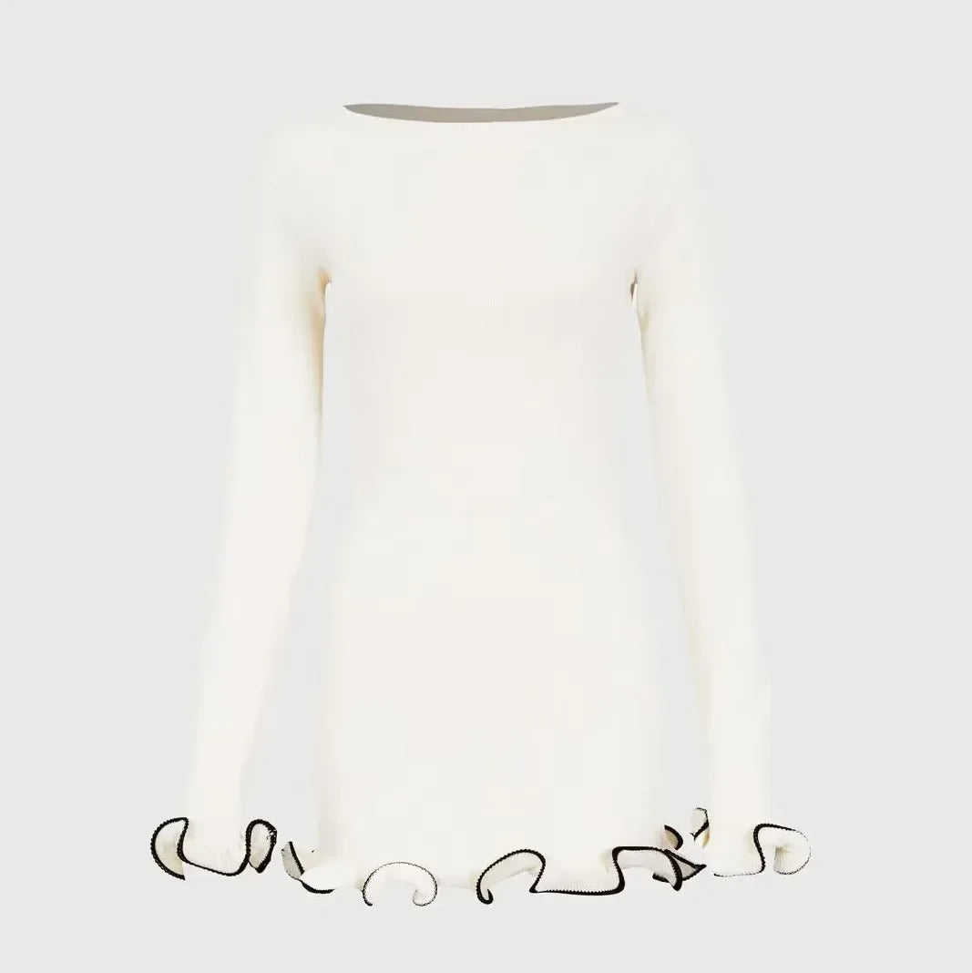 Vestido de punto ajustado con detalles en contraste y mangas largas – elegante, cómodo y perfecto para apariciones con estilo.