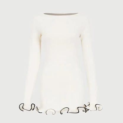 Vestido de punto ajustado con detalles en contraste y mangas largas – elegante, cómodo y perfecto para apariciones con estilo.