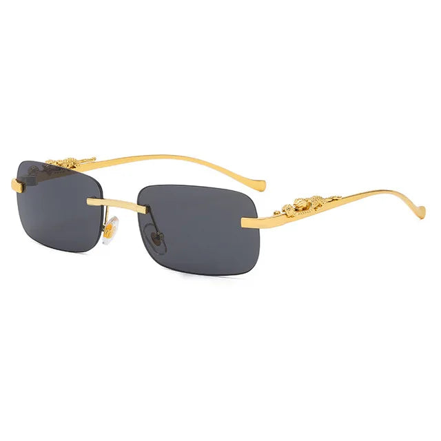 Rechteckige, randlose Sonnenbrille mit Metall-Scharnier & Cheetah-Details – unisex, retro & stylish mit UV400-Schutz für sonnige Tage.