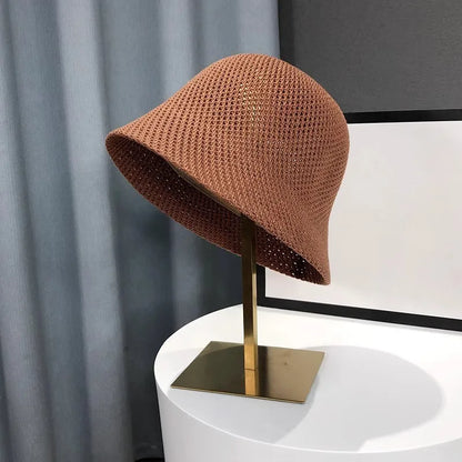 Leichter Bucket Hat mit luftiger Struktur – faltbar, atmungsaktiv und ideal für sonnige Tage.
