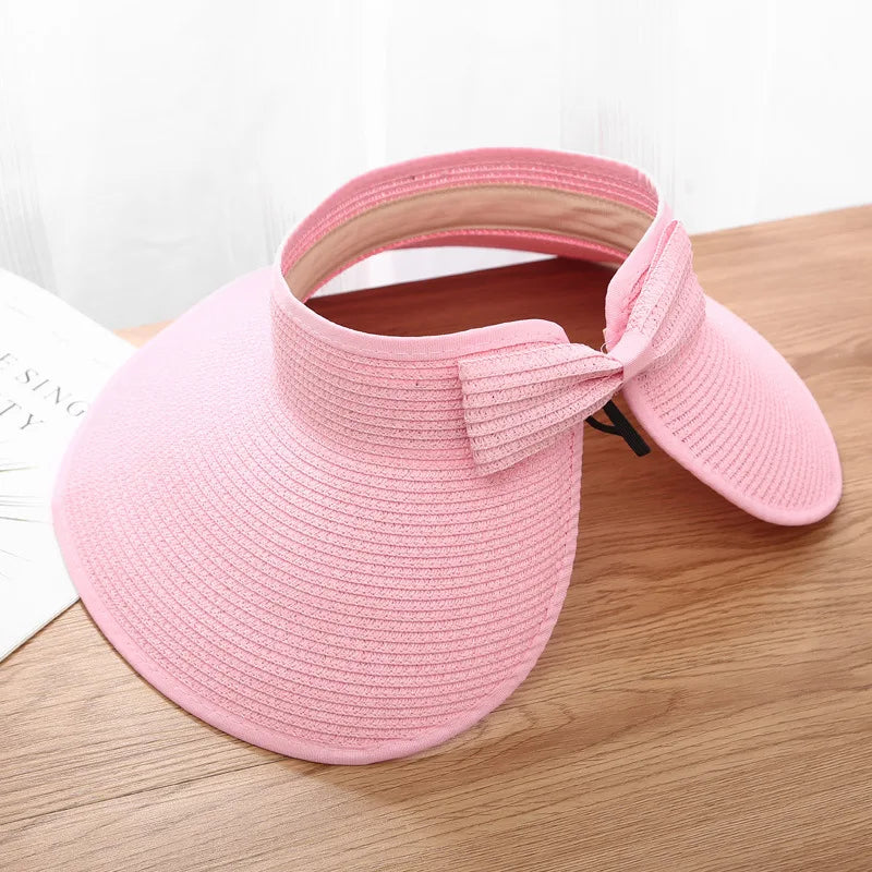 Faltbarer Strohhut mit großer Krempe & Schleife – leicht, elegant und ideal für Reisen, Strand und zuverlässigen UV-Schutz.