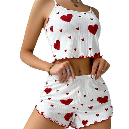 Zweiteiliges Pyjama-Set mit Tanktop und Shorts – weich, luftig und mit Herzprint, ideal für entspannte Nächte im Sommer.