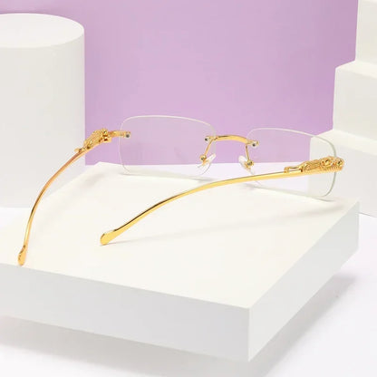 Rechteckige, randlose Sonnenbrille mit Metall-Scharnier & Cheetah-Details – unisex, retro & stylish mit UV400-Schutz für sonnige Tage.