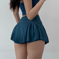 Cloud Hide Sportrock mit High Waist & integrierten Shorts – schnelltrocknend, bequem und ideal für Workout, Tennis, Radfahren oder Tanzen.