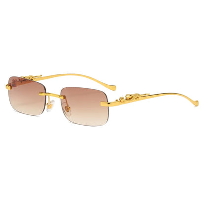 Rechteckige, randlose Sonnenbrille mit Metall-Scharnier & Cheetah-Details – unisex, retro & stylish mit UV400-Schutz für sonnige Tage.