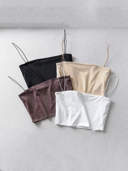 Elastisches Crop-Cami aus Baumwolle – ärmellos, bequem und perfekt für leichte Sommerlooks oder den Alltag.