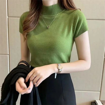 Leichter Strickpullover mit kurzem Arm und Rollkragen – schlicht, bequem und perfekt für Übergangslooks mit Stil.
