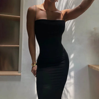 Black bodycon dress with spaghetti straps and back cutout – sleeveless, figure-hugging, and ideal for club or streetwear.