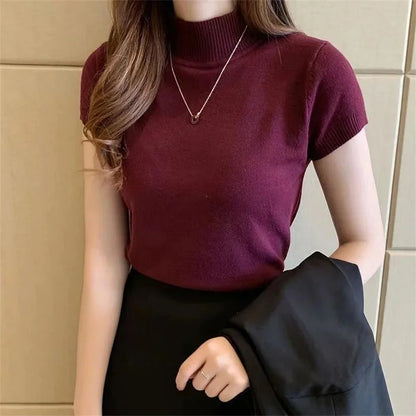 Leichter Strickpullover mit kurzem Arm und Rollkragen – schlicht, bequem und perfekt für Übergangslooks mit Stil.