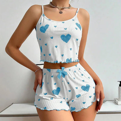 Zweiteiliges Pyjama-Set mit Tanktop und Shorts – weich, luftig und mit Herzprint, ideal für entspannte Nächte im Sommer.