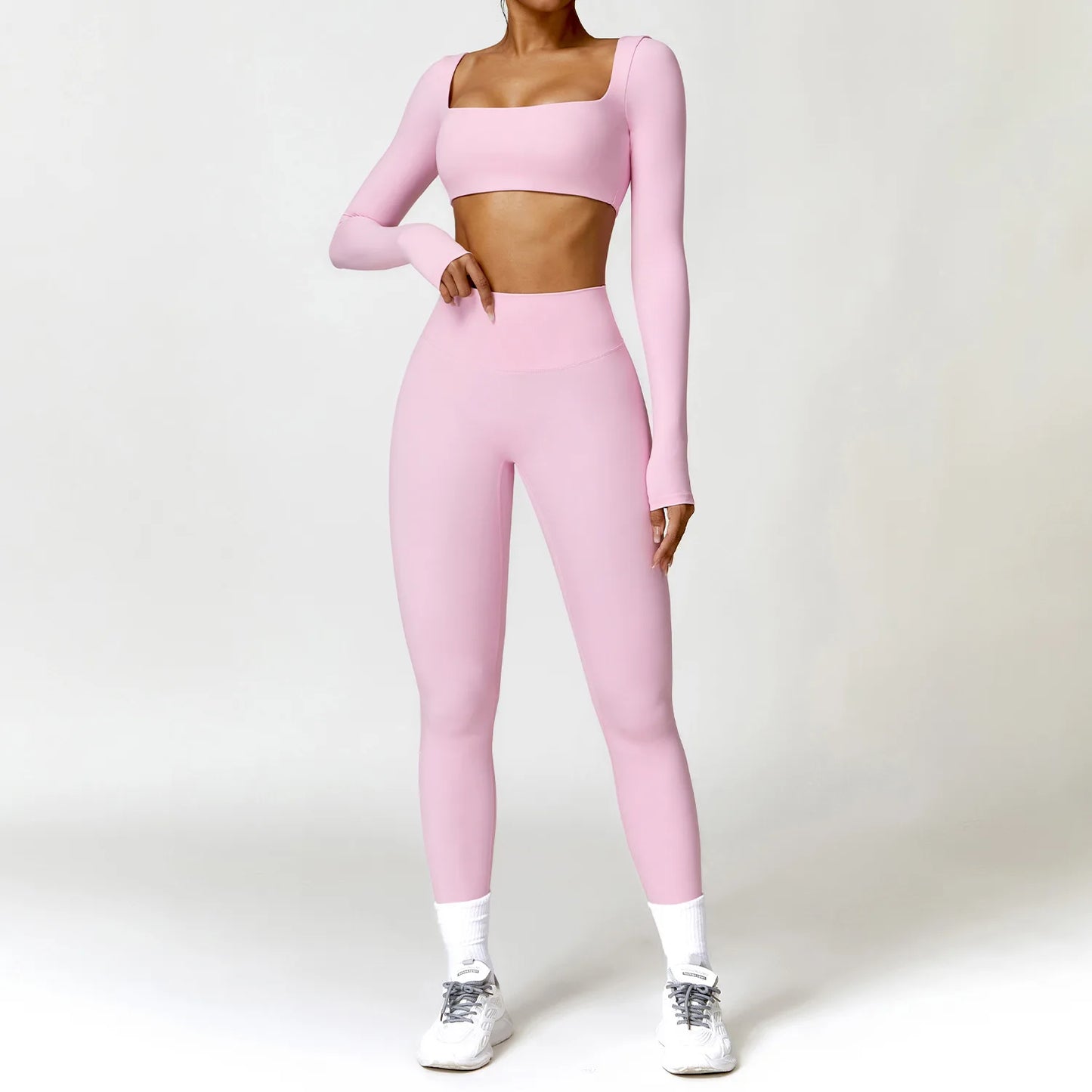 Conjunto deportivo de 2 piezas con camiseta de manga larga de secado rápido y leggings – cómodo, funcional y perfecto para yoga, entrenamiento o correr.
