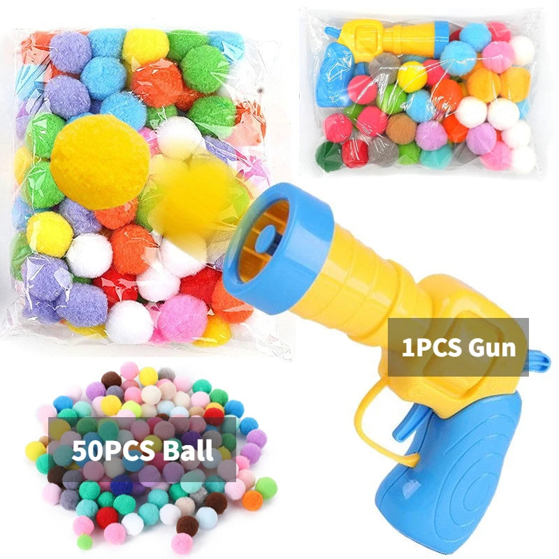 Katzenspielzeug mit Plüschball-Shooter – schießt Mini-Pompoms für interaktiven Spielspaß, ideal zur Beschäftigung von Wohnungskatzen.