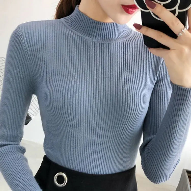 Fitted knit sweater with stand-up collar – simple, cozy, and perfect for stylish looks on cool days.