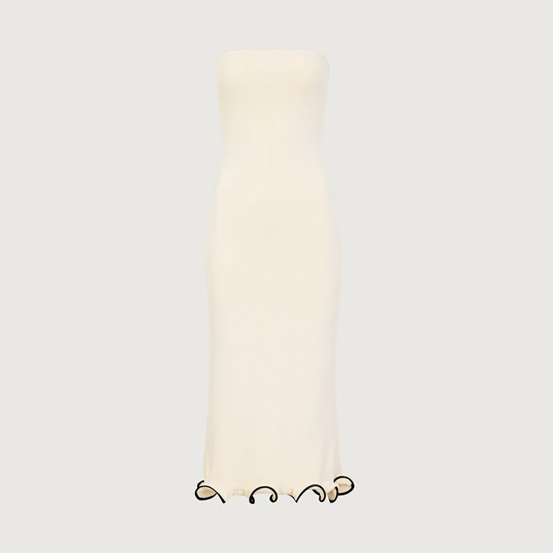 Vestido de punto ajustado con detalles en contraste y mangas largas – elegante, cómodo y perfecto para apariciones con estilo.