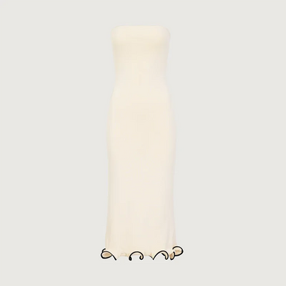 Vestido de punto ajustado con detalles en contraste y mangas largas – elegante, cómodo y perfecto para apariciones con estilo.
