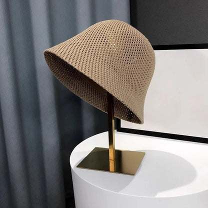 Leichter Bucket Hat mit luftiger Struktur – faltbar, atmungsaktiv und ideal für sonnige Tage.