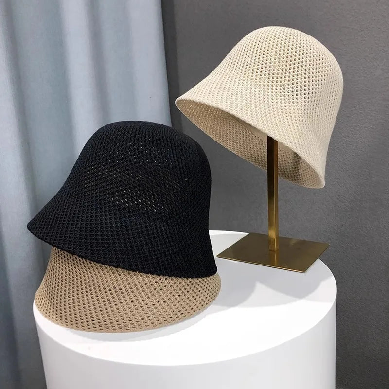 Leichter Bucket Hat mit luftiger Struktur – faltbar, atmungsaktiv und ideal für sonnige Tage.