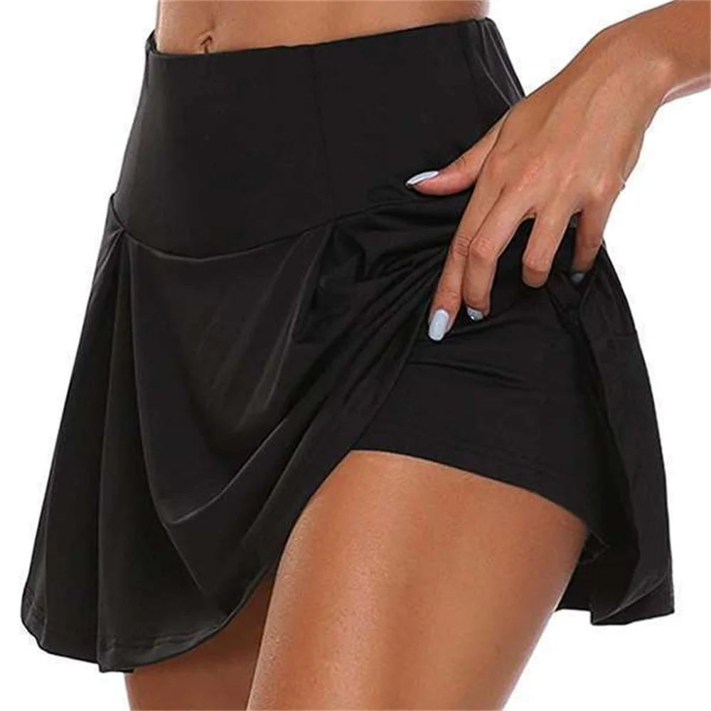 High-Waist Sport-Culottes mit integrierter Shorts – schnelltrocknend, blickdicht und ideal für Yoga, Tennis, Running oder Fitness.