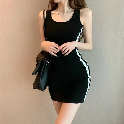 Figure-hugging summer dress with spaghetti straps – sleeveless, stretchy, and perfect for casual looks with a touch of elegance.