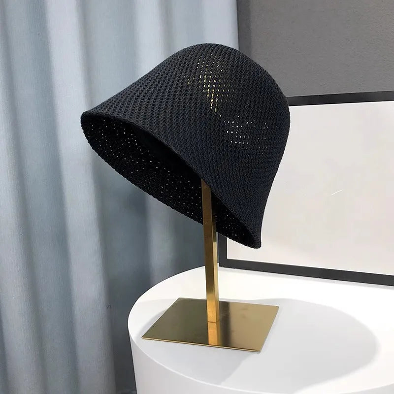 Leichter Bucket Hat mit luftiger Struktur – faltbar, atmungsaktiv und ideal für sonnige Tage.