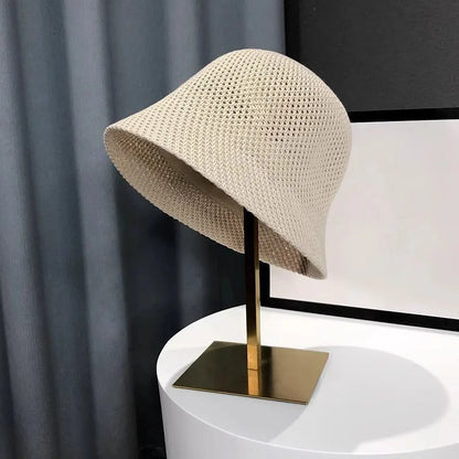 Leichter Bucket Hat mit luftiger Struktur – faltbar, atmungsaktiv und ideal für sonnige Tage.