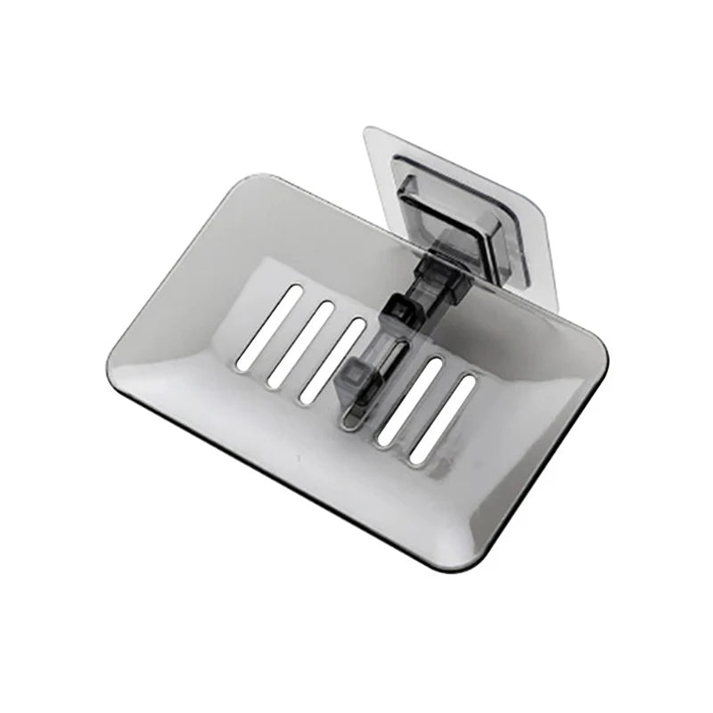 Transparente Seifenablage zur Wandmontage ohne Bohren – selbstklebend, mit Abflussdesign und ideal für Dusche oder Waschbecken.