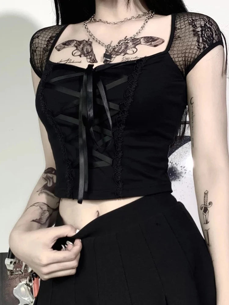 Figure-hugging Gothic top with lace, mesh, and bandage details – black, edgy, and ideal for eye-catching streetwear styles.