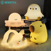 Pinguin-Nachtlicht aus Silikon mit Touch-Steuerung – USB-aufladbar und ideal als Schlummerlicht.