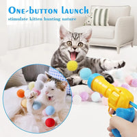 Katzenspielzeug mit Plüschball-Shooter – schießt Mini-Pompoms für interaktiven Spielspaß, ideal zur Beschäftigung von Wohnungskatzen.