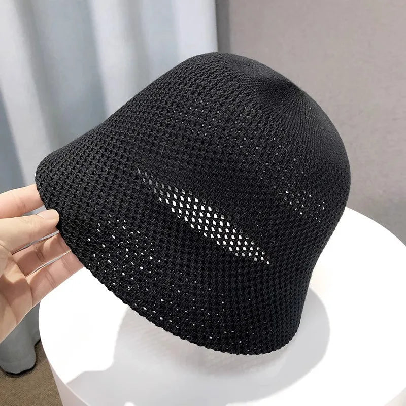 Leichter Bucket Hat mit luftiger Struktur – faltbar, atmungsaktiv und ideal für sonnige Tage.