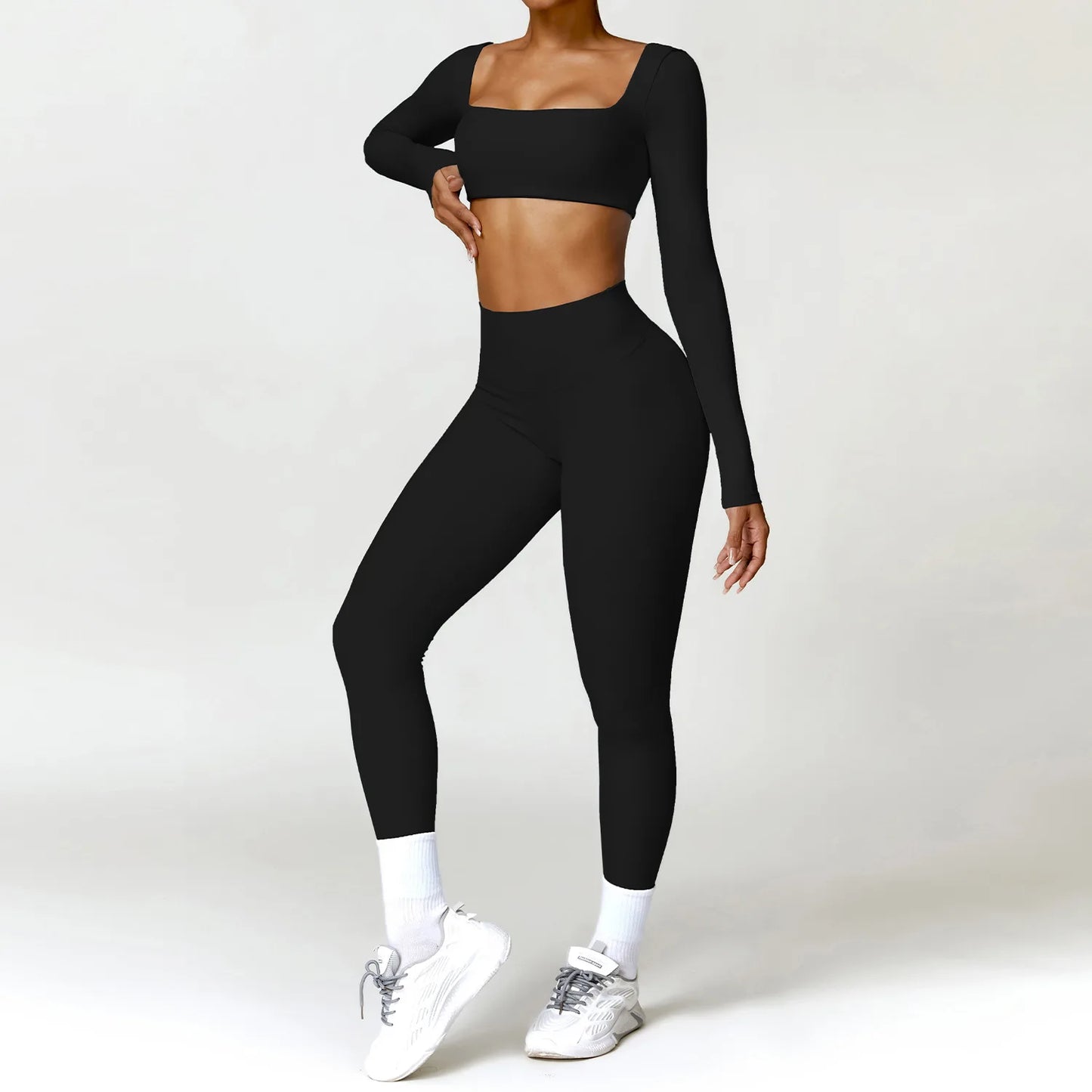 Conjunto deportivo de 2 piezas con camiseta de manga larga de secado rápido y leggings – cómodo, funcional y perfecto para yoga, entrenamiento o correr.