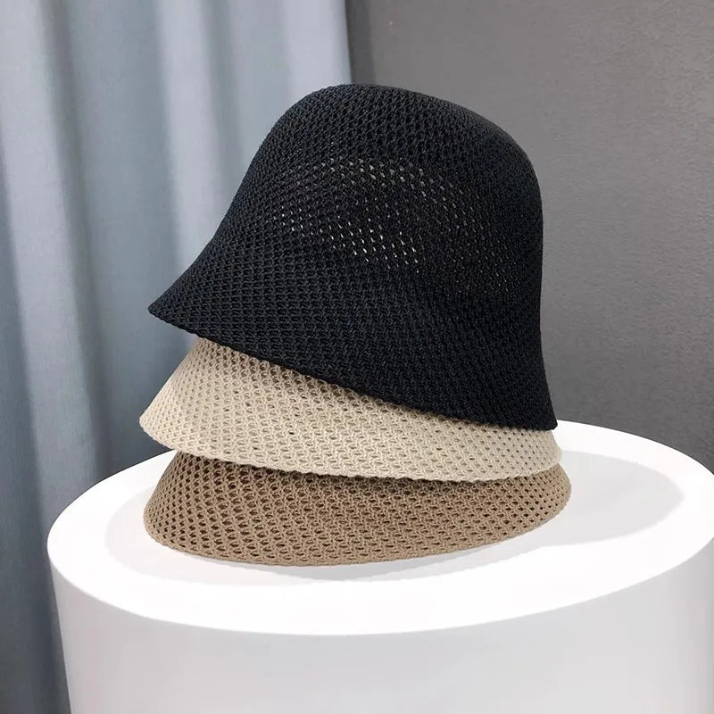 Leichter Bucket Hat mit luftiger Struktur – faltbar, atmungsaktiv und ideal für sonnige Tage.