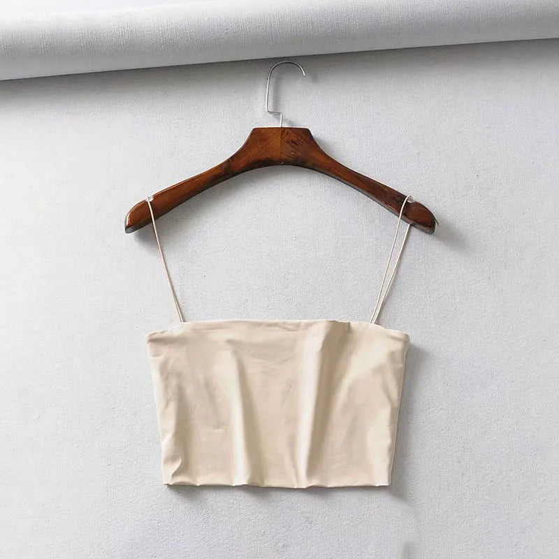 Elastisches Crop-Cami aus Baumwolle – ärmellos, bequem und perfekt für leichte Sommerlooks oder den Alltag.
