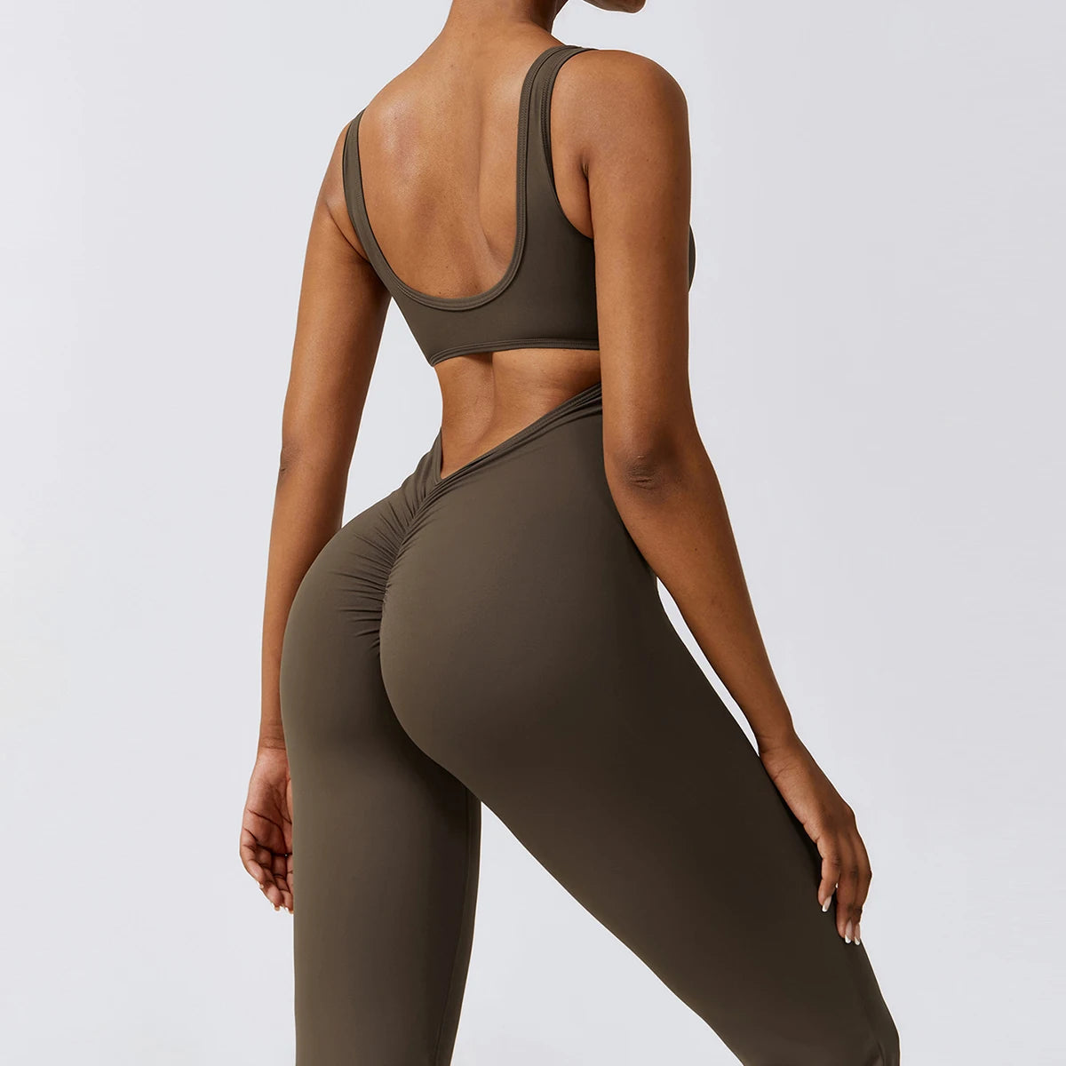 Jumpsuit de fitness avec décolleté en V dans le dos – extensible, ajusté et parfait pour le yoga, l'entraînement ou le workout.