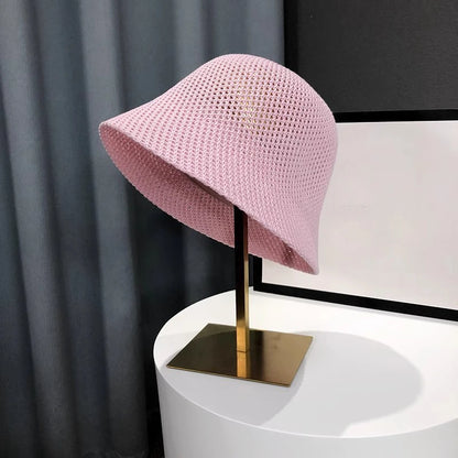Leichter Bucket Hat mit luftiger Struktur – faltbar, atmungsaktiv und ideal für sonnige Tage.