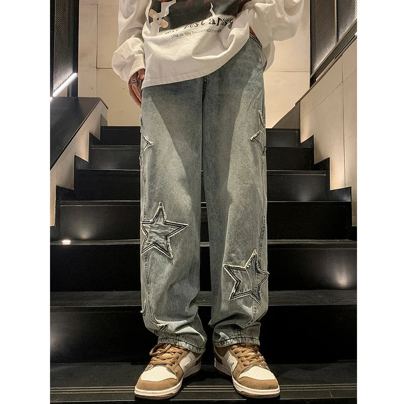 Weite Jeans mit Stern-Stickerei – gerade geschnitten, im Y2K-Stil und perfekt für auffällige Hip-Hop- und Streetwear-Looks.