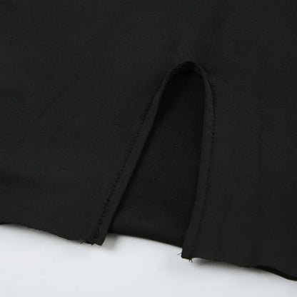 Black mini dress with long sleeves and lacing – backless and figure-hugging in streetwear look